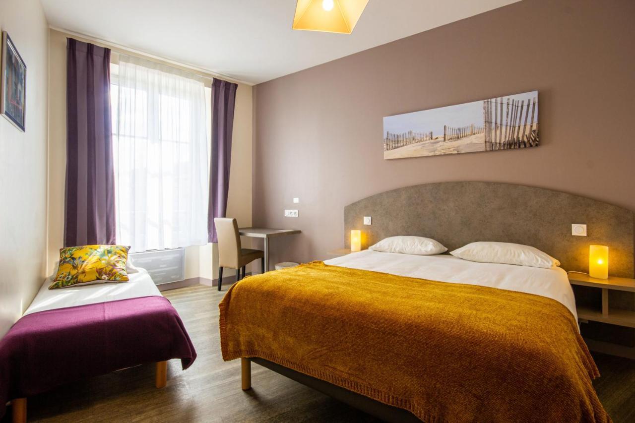 Cit'Hotel Le Commerce ساوجون المظهر الخارجي الصورة